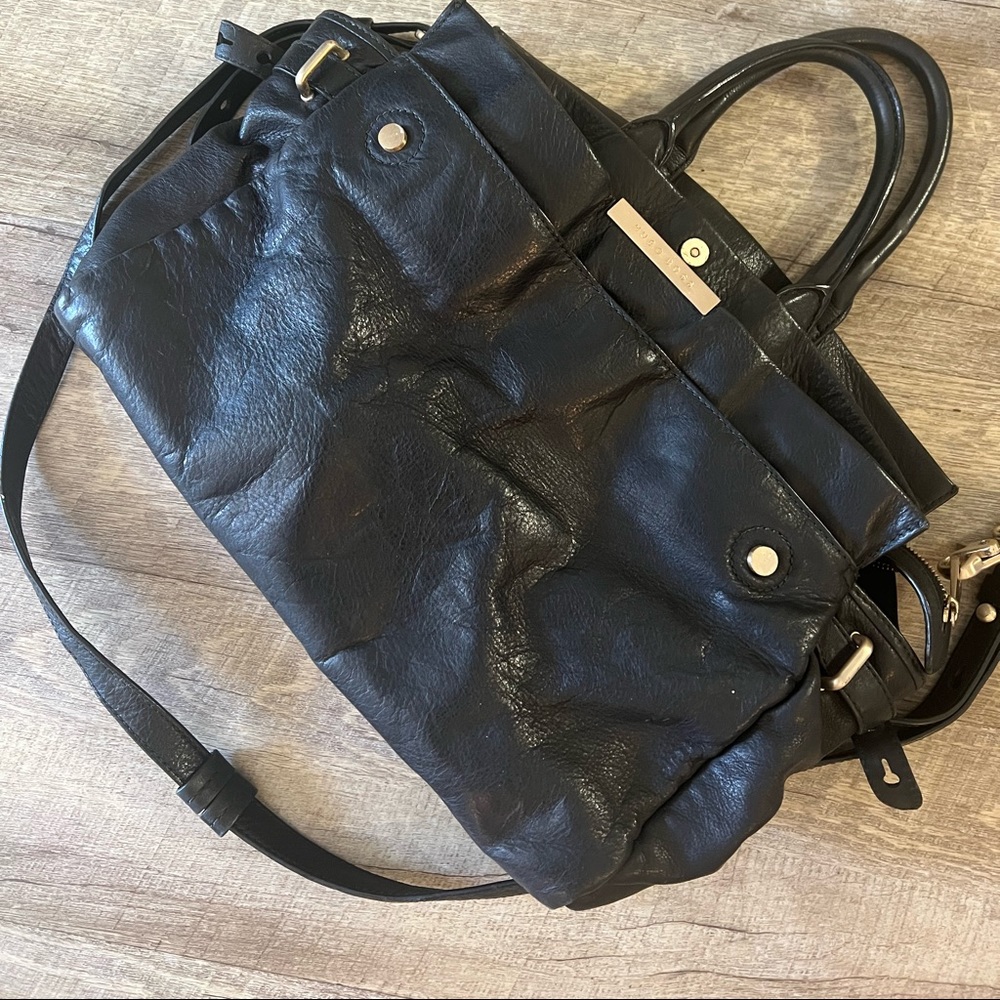 Great quality leather bag fits laptop and more